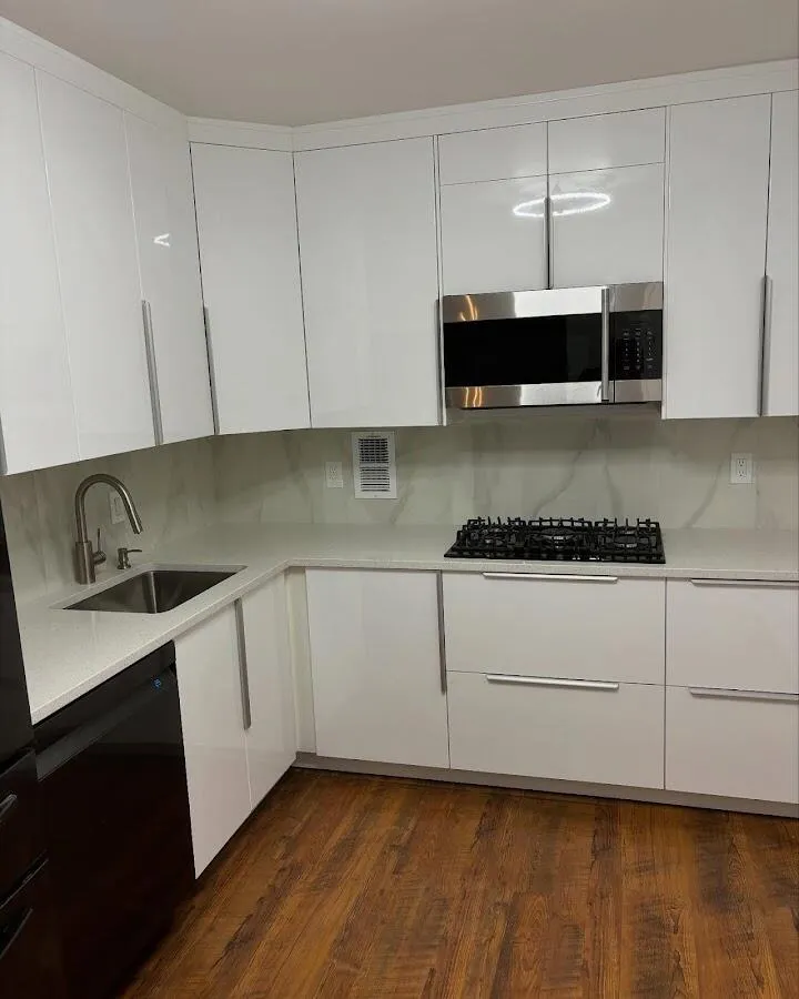 Restored kitchen with white cabinets after water damage in Mabank